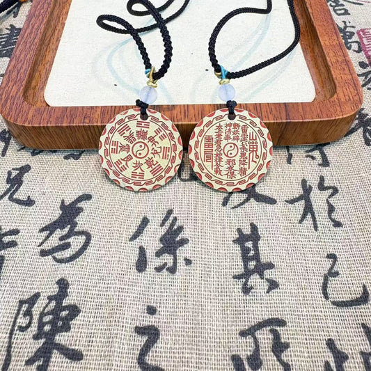 Model wearing brass Bagua pendant necklace — vintage Feng Shui jewelry