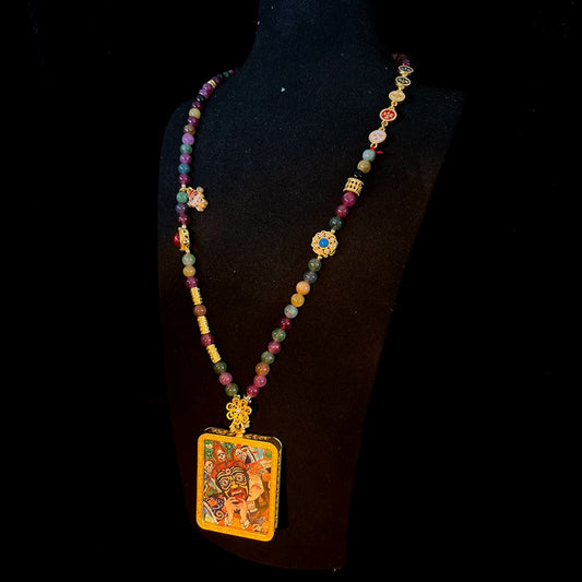 Tourmaline bead necklace with Zakiralam Thangka pendant