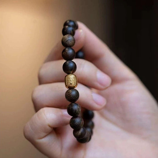 Qi-Nan agarwood bracelet with Zakiralam amulet