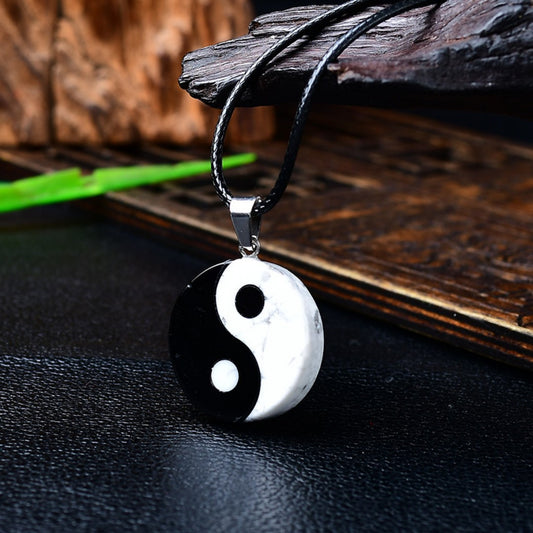 Yin Yang Bagua pendant necklace with white turquoise and black obsidian stones symbolizing balance and harmony