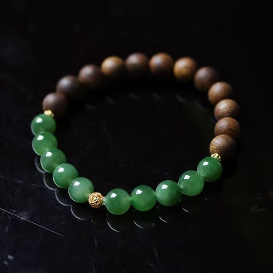 Hetian jade and agarwood bead bracelet with gold Fu charm