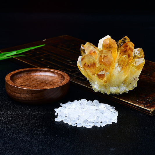 Yellow citrine crystal cluster on walnut base with clear quartz stones