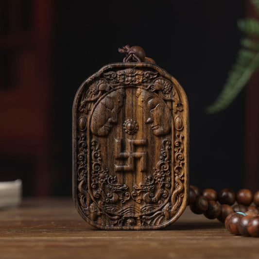 Back view of a wooden Buddha amulet