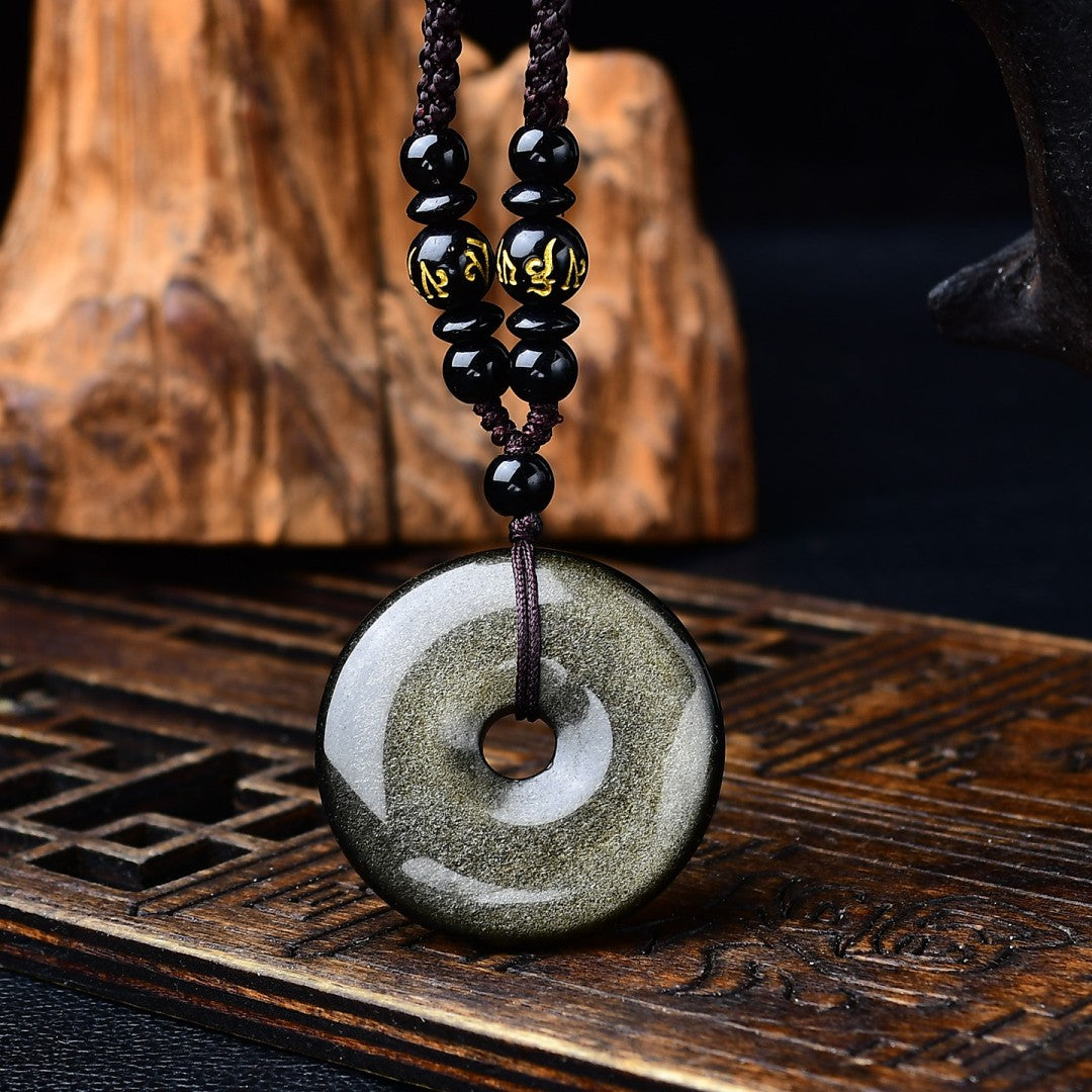 Golden obsidian Pi disc pendant with braided rope and mantra bead