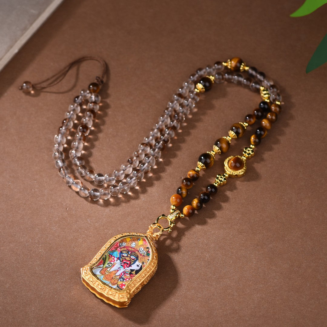 Clear quartz and tiger's eye necklace with Zakiram Tibetan Thangka pendant