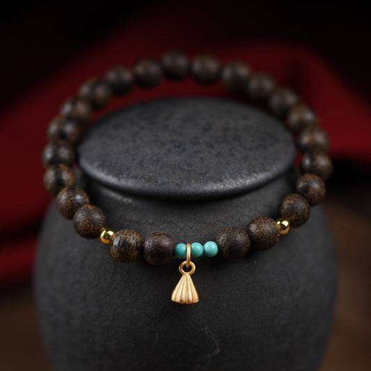 Agarwood and turquoise bead bracelet with lotus pod charm