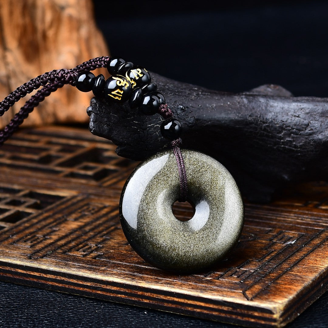 Golden obsidian Pi disc pendant with braided rope and mantra bead