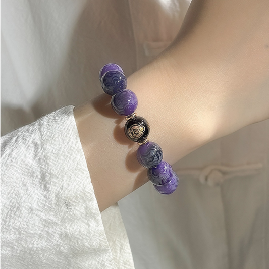 Nine Flames Bodhi bead bracelet with Six-Syllable Mantra engraving — black glass accent