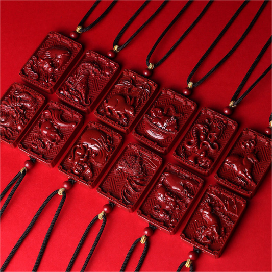 Cinnabar Chinese zodiac pendant necklace with carved zodiac animal and engraved character