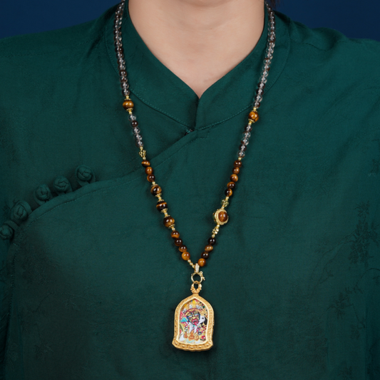 Clear quartz and tiger's eye necklace with Zakiram Tibetan Thangka pendant