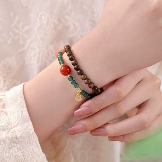 Blue jade and Qi-Nan agarwood dual-wrap bracelet with Ji charm