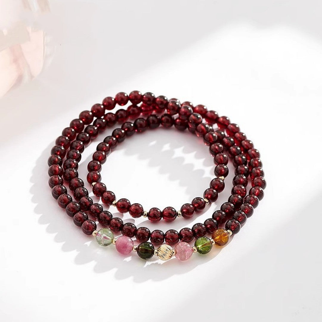 Garnet tourmaline triple-loop Feng Shui bracelet