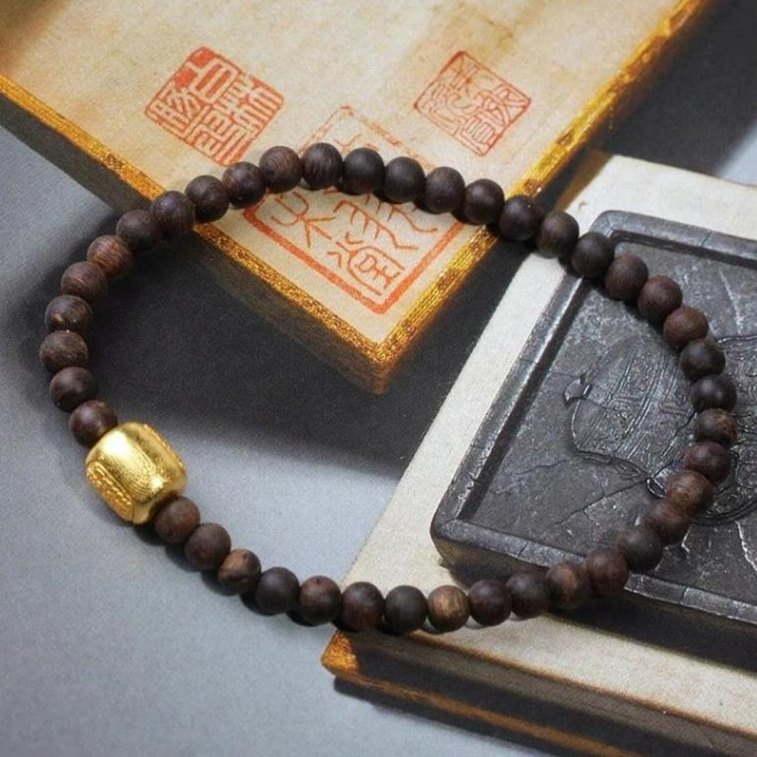 Qi-Nan agarwood bracelet with Zakiralam amulet