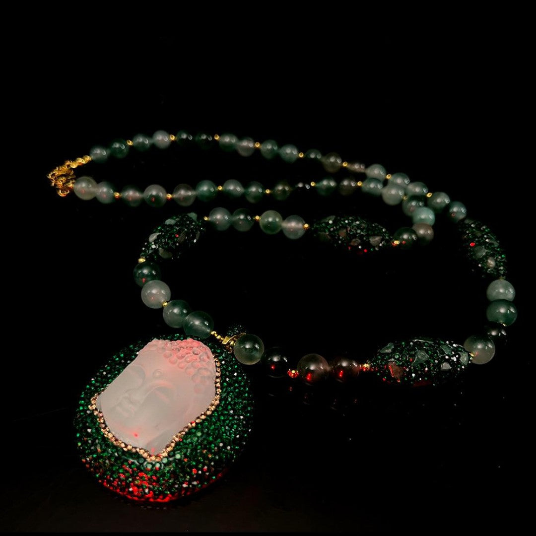 Multicolor bead necklace with translucent ivory Buddha head pendant