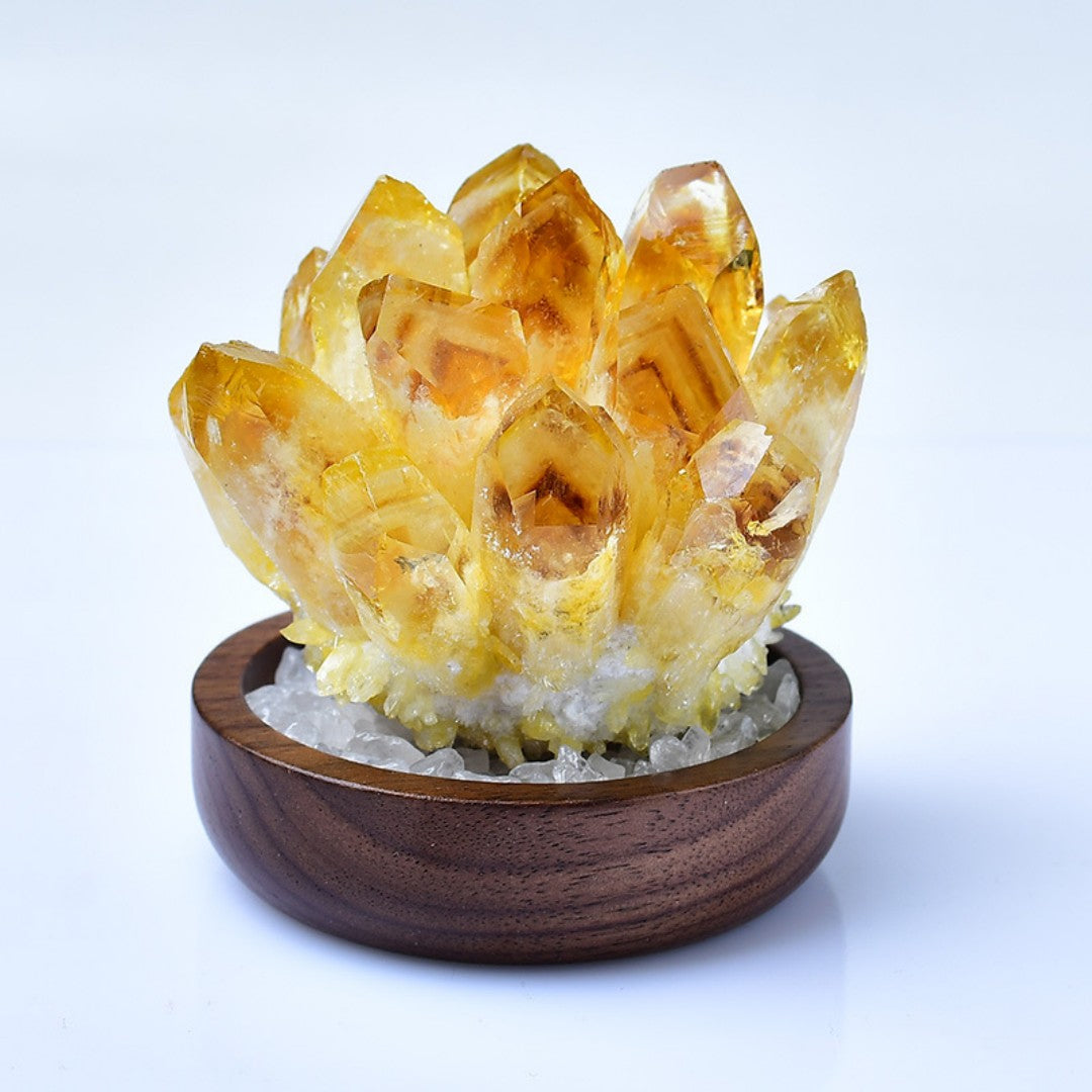 Yellow citrine crystal cluster on walnut base with clear quartz stones