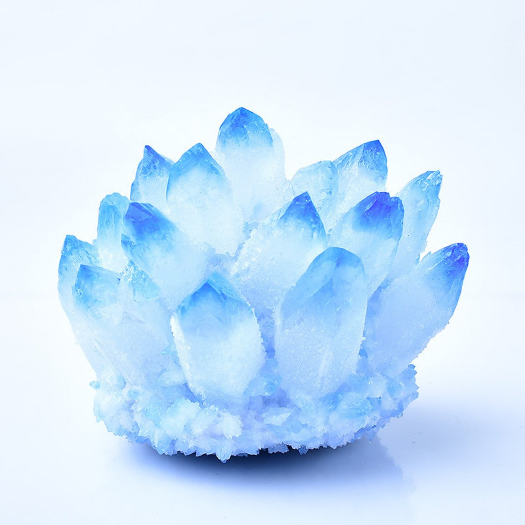 Blue quartz crystal cluster on green peridot chip bed with wooden display