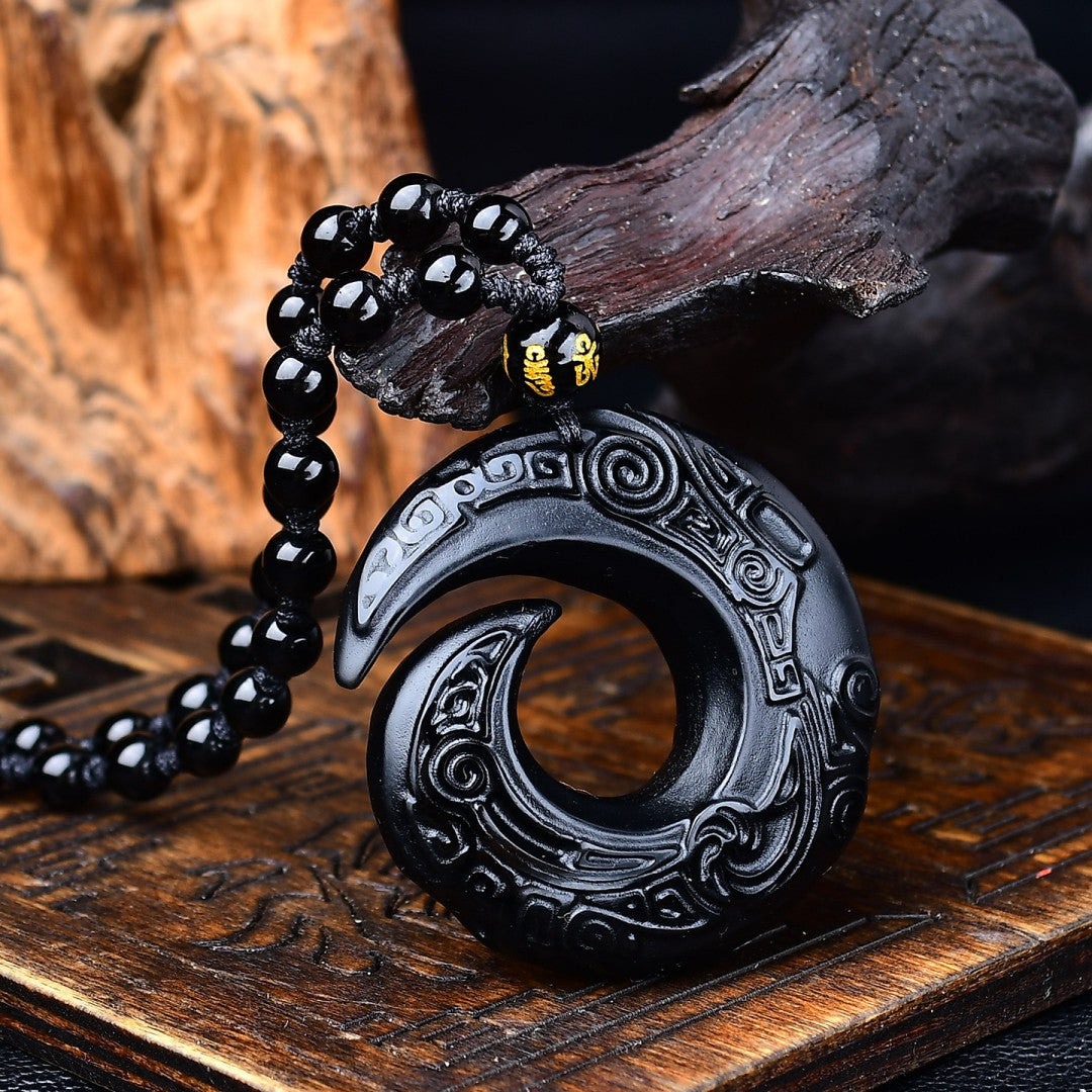 Black obsidian crescent pendant necklace with six-word mantra bead