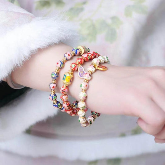 Three color variations of cloisonné enamel flower bracelet