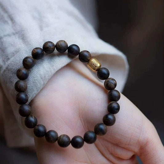 Qi-Nan agarwood bracelet with Zakiralam amulet