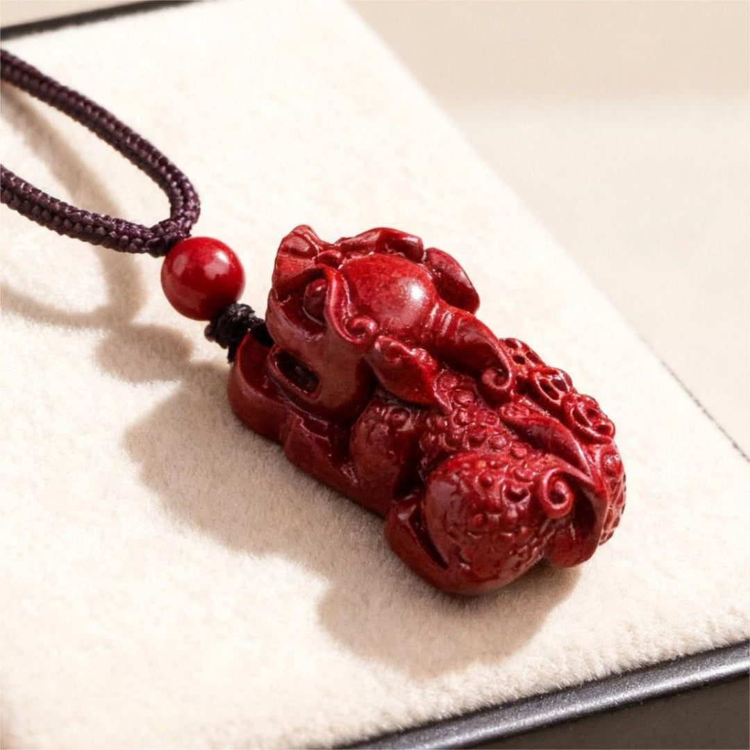 Cinnabar Pixiu three-coin pendant necklace with sparkling red finish and traditional Eastern symbolism