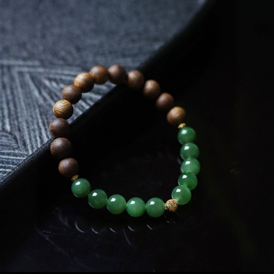 Hetian jade and agarwood bead bracelet with gold Fu charm