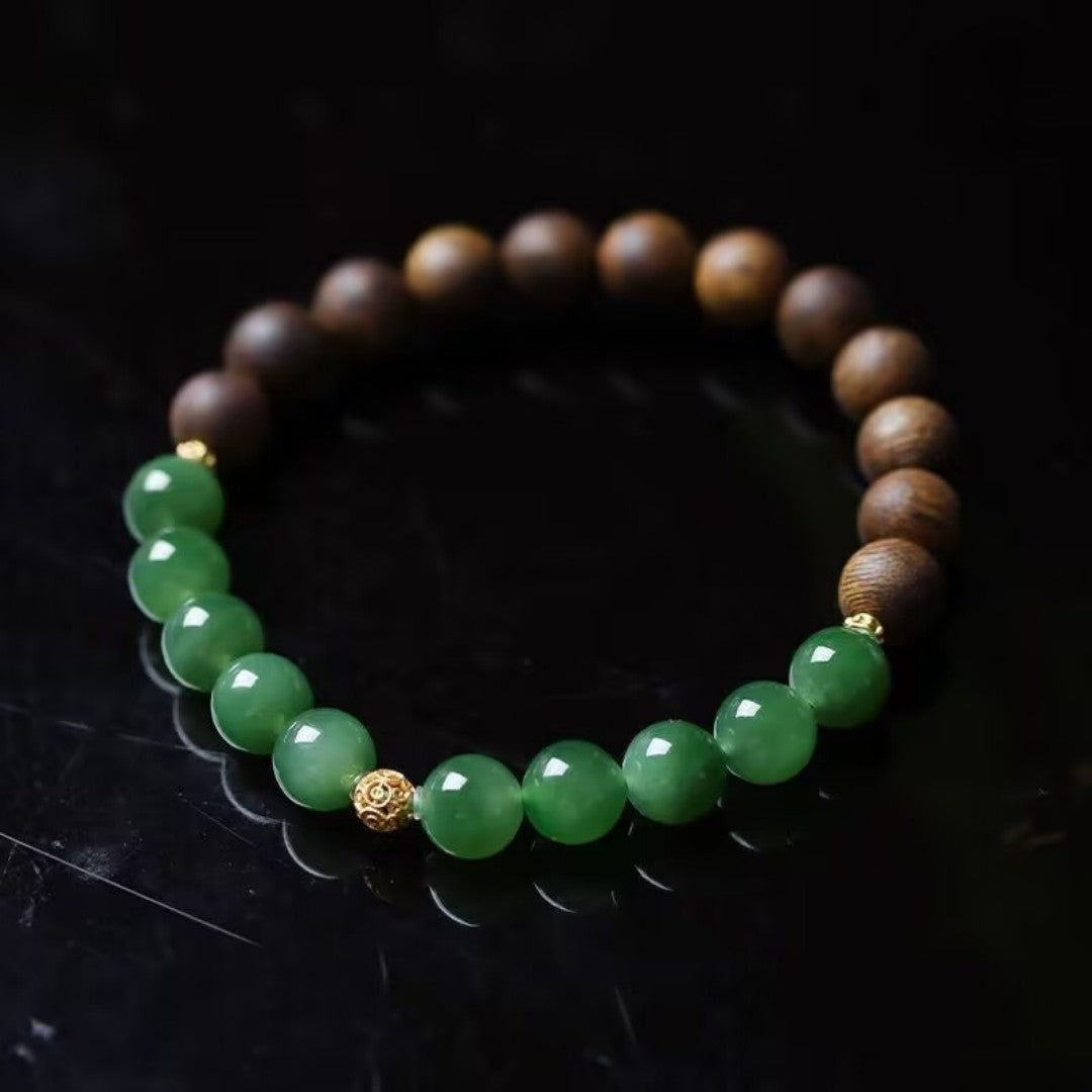 Hetian jade and agarwood bead bracelet with gold Fu charm