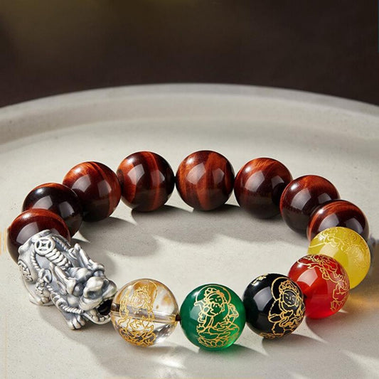 Brown Tiger’s Eye bead bracelet with five multicolor carved wealth god beads and a silver Pixiu charm