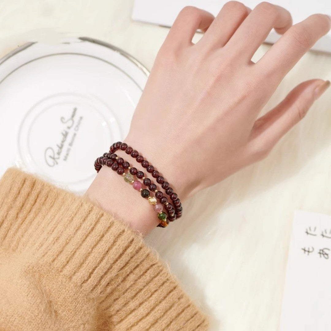 Garnet tourmaline triple-loop Feng Shui bracelet