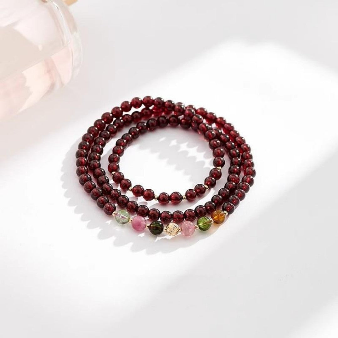 Garnet tourmaline triple-loop Feng Shui bracelet