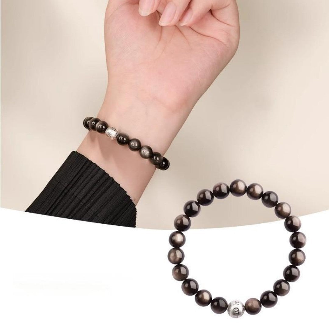 Silver obsidian bracelet with six-word mantra bead