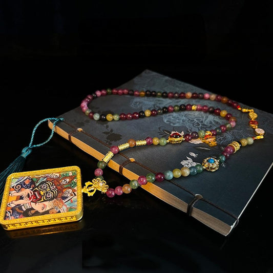 Tourmaline bead necklace with Zakiralam Thangka pendant