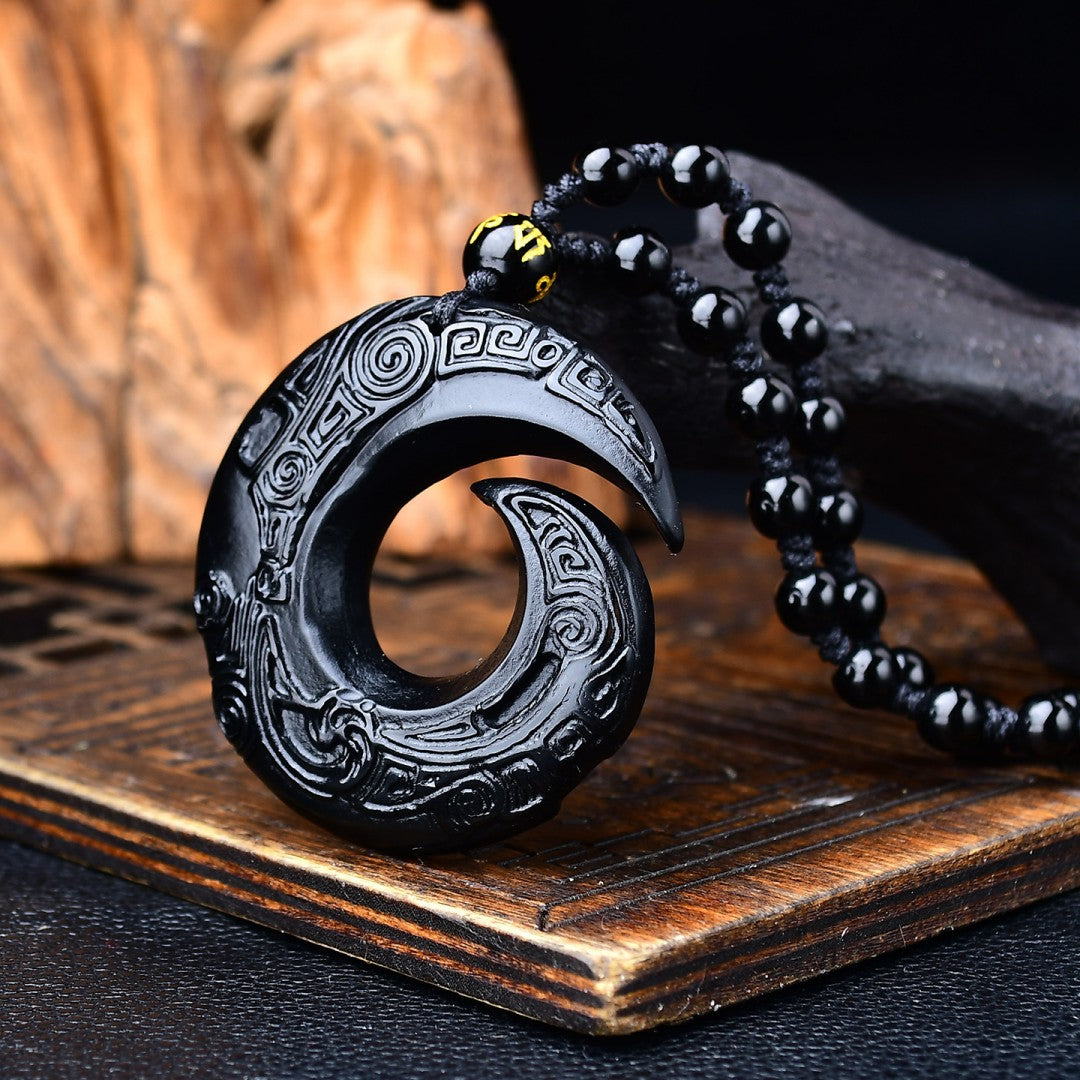 Black obsidian crescent pendant necklace with six-word mantra bead