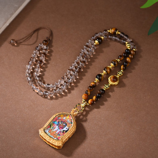 Clear quartz and tiger's eye necklace with Zakiram Tibetan Thangka pendant