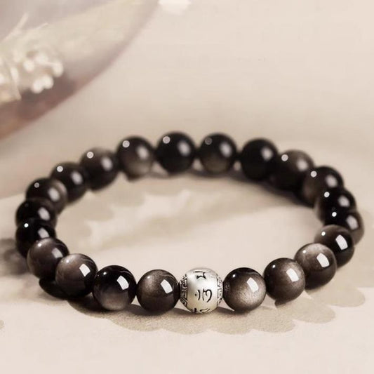 Silver obsidian bracelet with six-word mantra bead