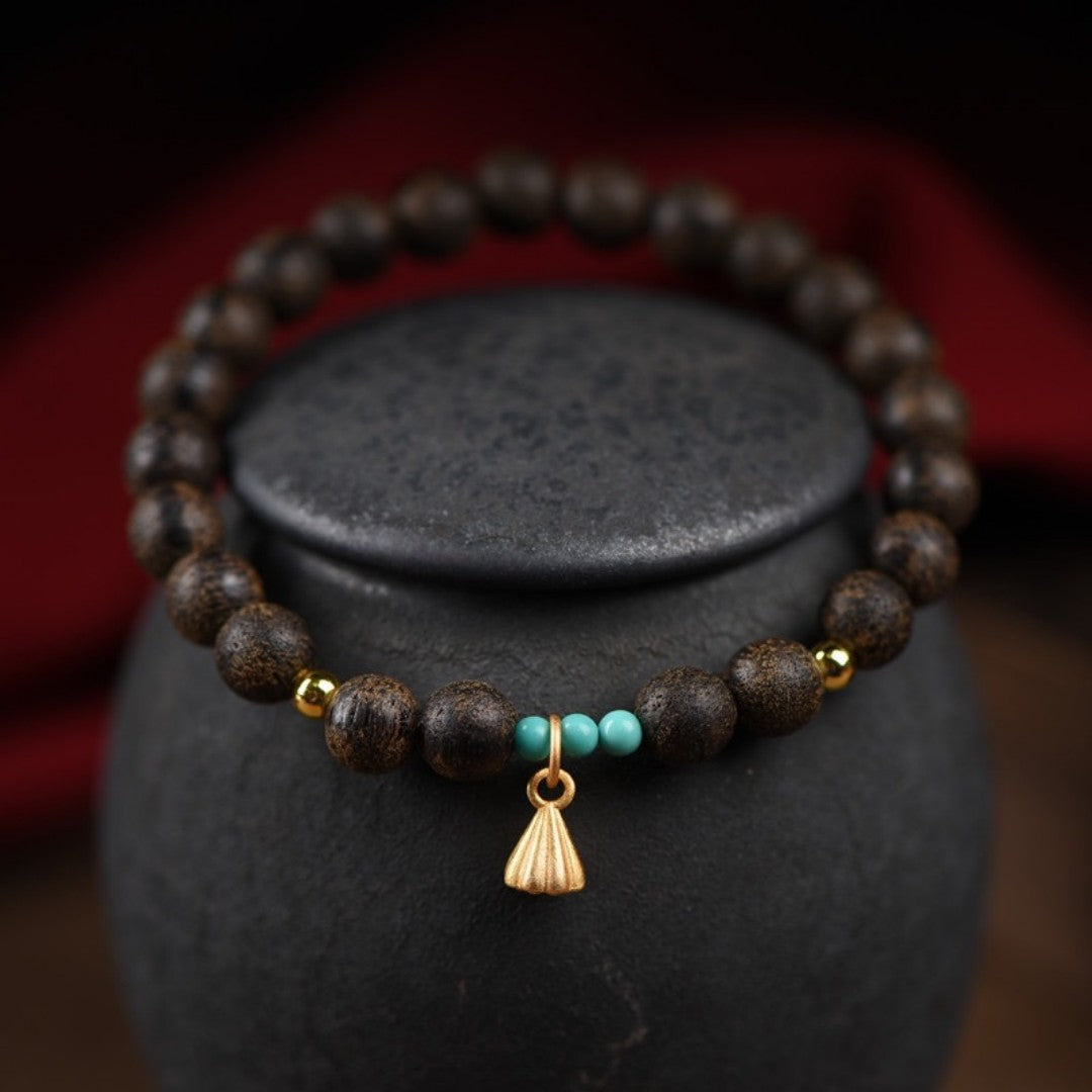 Agarwood and turquoise bead bracelet with lotus pod charm