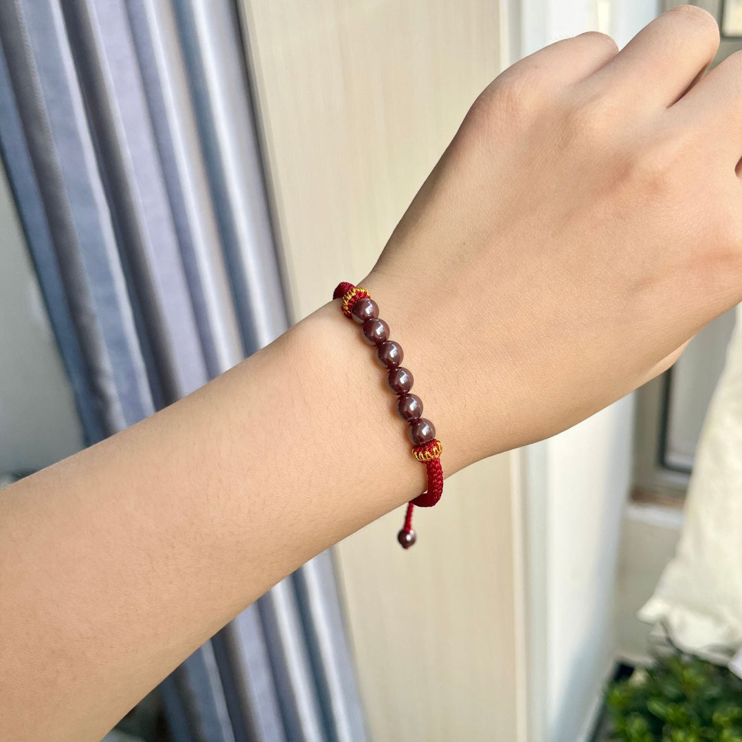 Handwoven cinnabar bracelet with adjustable cord