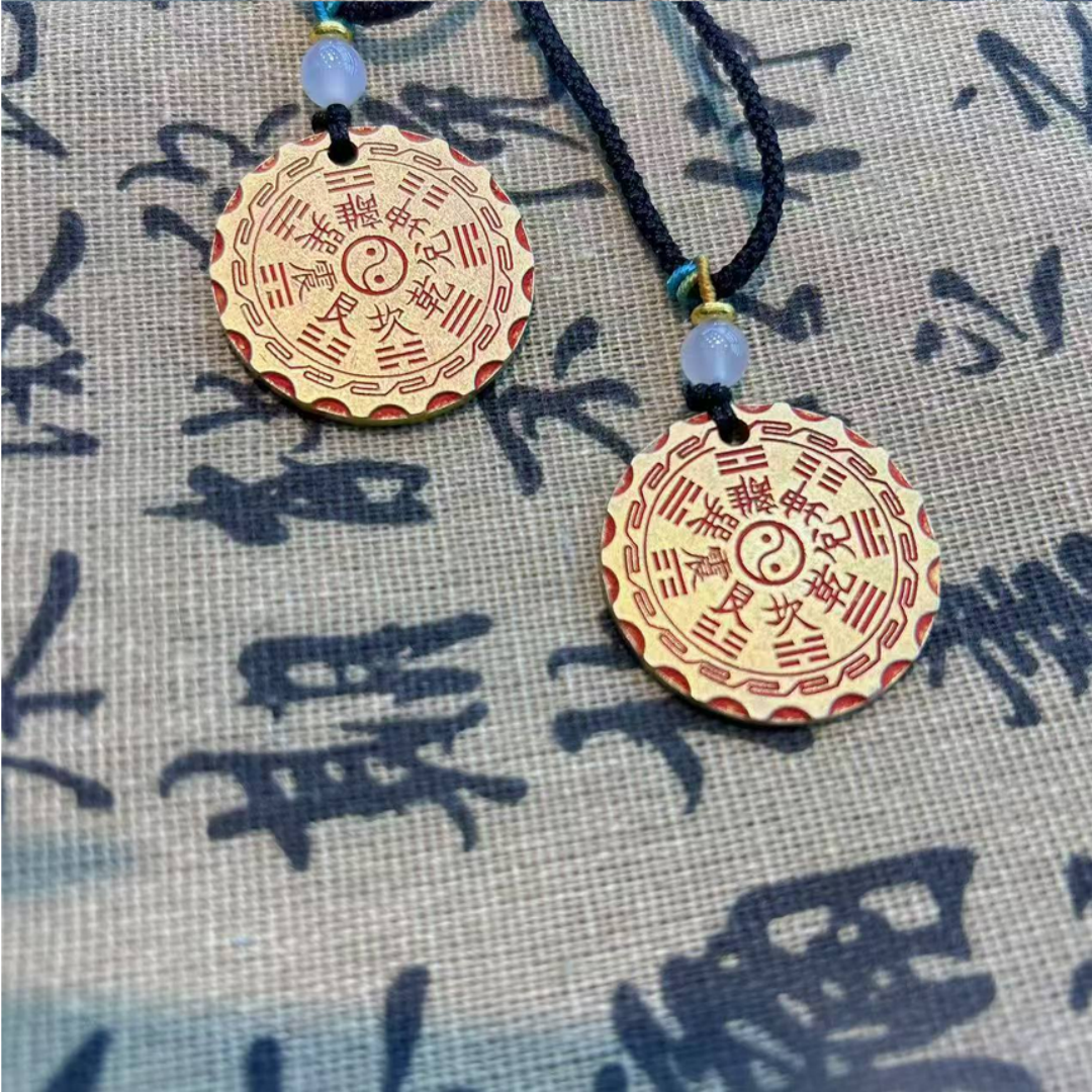 Model wearing brass Bagua pendant necklace — vintage Feng Shui jewelry