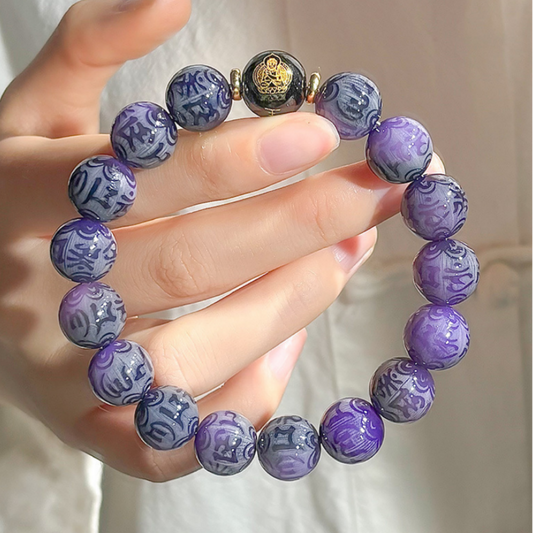 Nine Flames Bodhi bead bracelet with Six-Syllable Mantra engraving — black glass accent