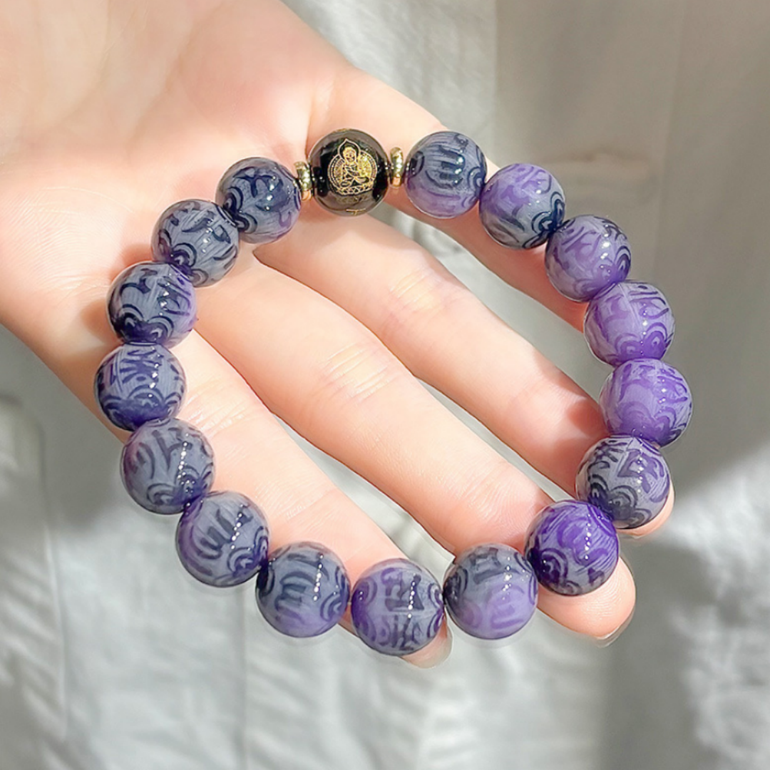 Nine Flames Bodhi bead bracelet with Six-Syllable Mantra engraving — black glass accent