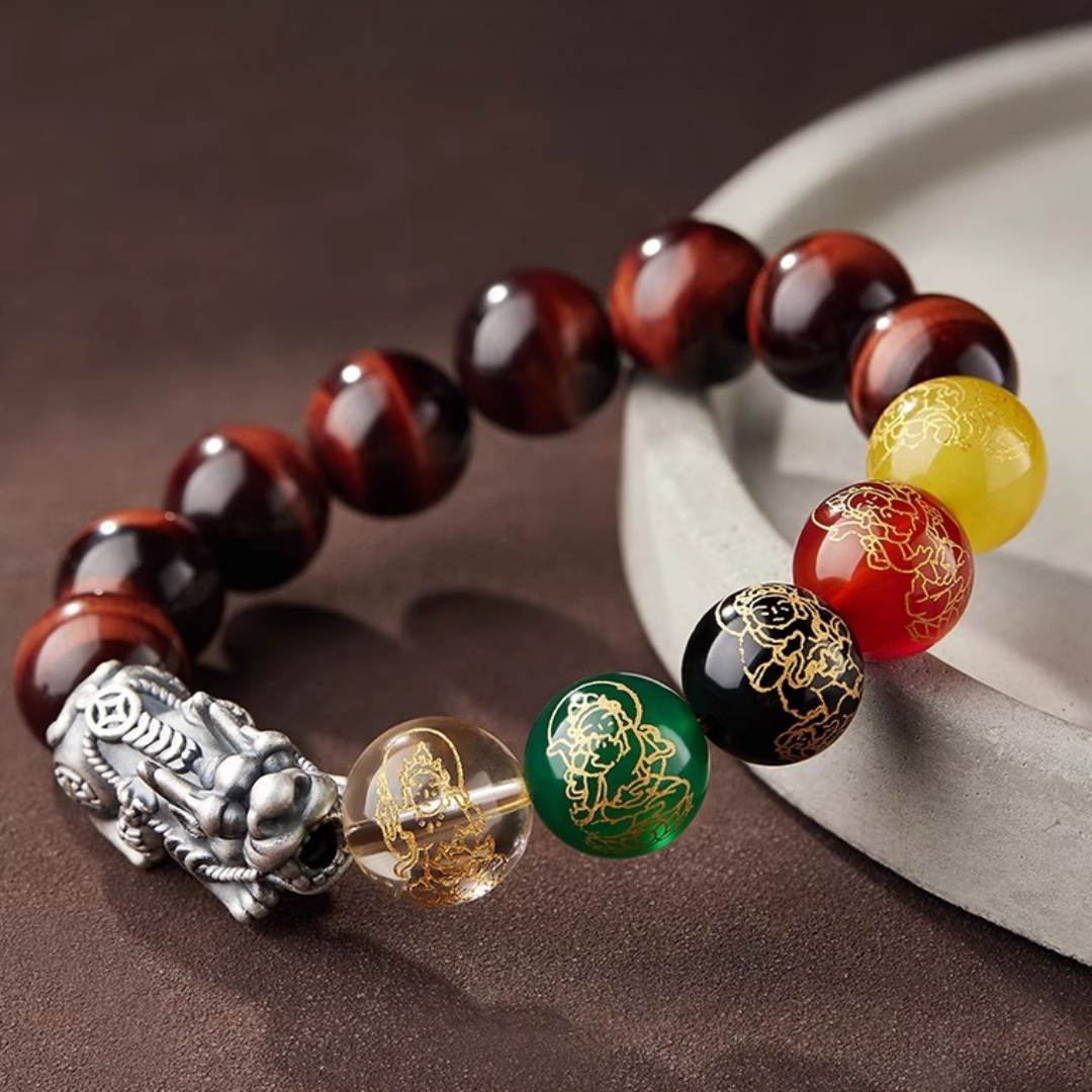 Brown Tiger’s Eye bead bracelet with five multicolor carved wealth god beads and a silver Pixiu charm