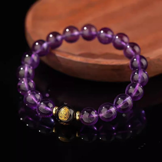 Purple amethyst bracelet with a black bead painted with Samantabhadra Bodhisattva